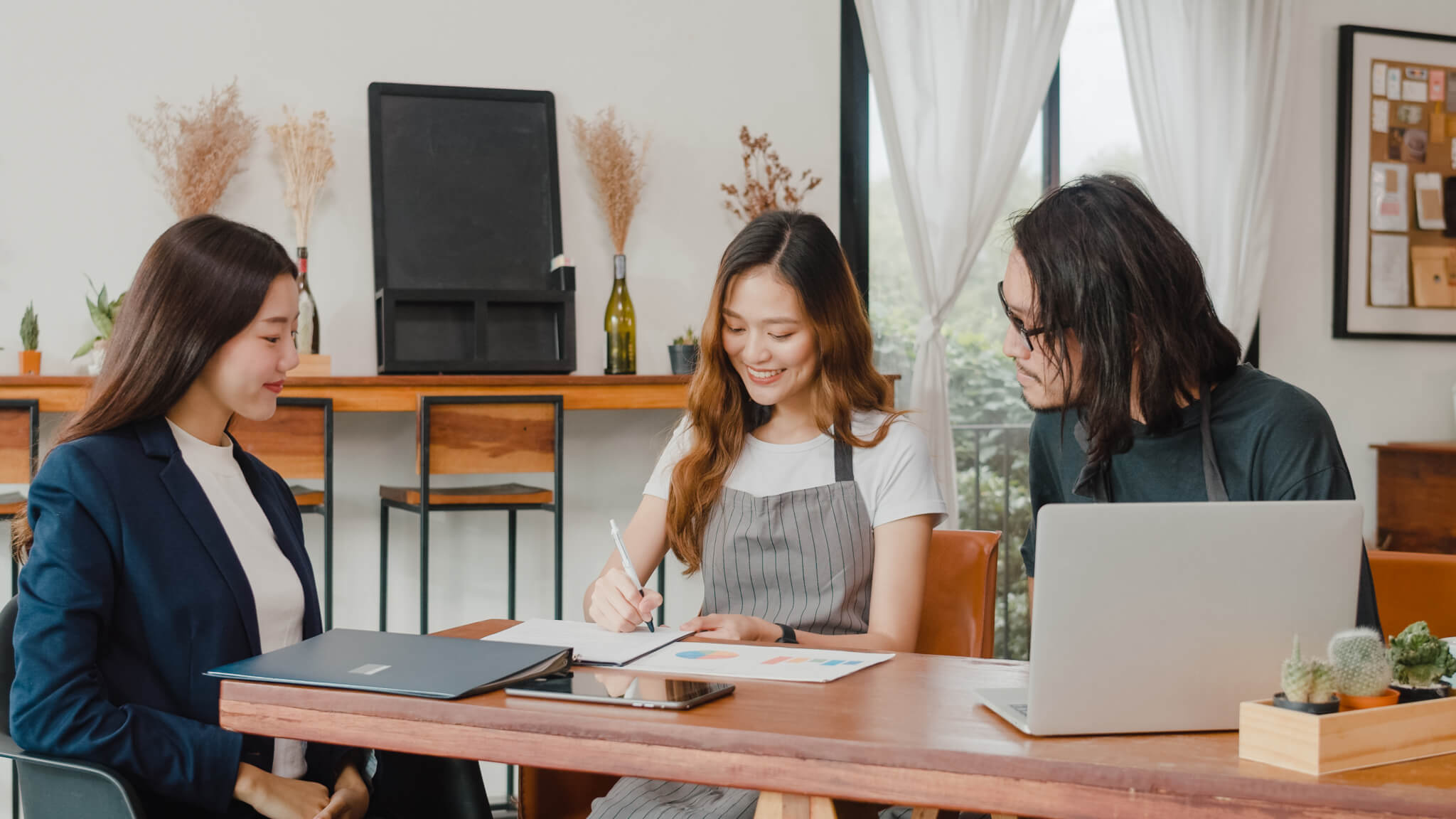 asian-small-business-owners-couple-meeting-with-consultant-talking-about-business-plan-.jpg
